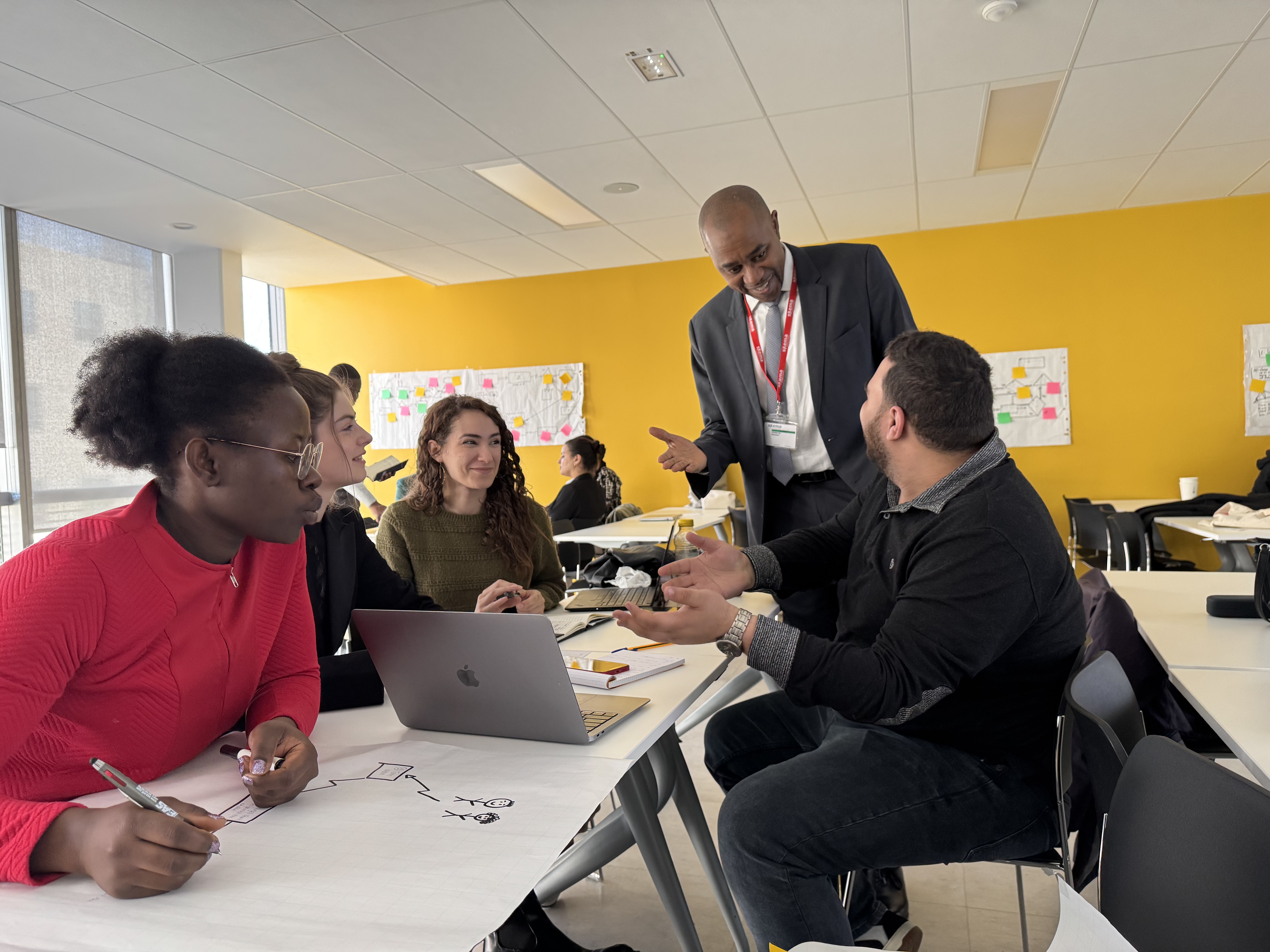 Professor Salouhou guiding a group discussion at SKEMA Business School